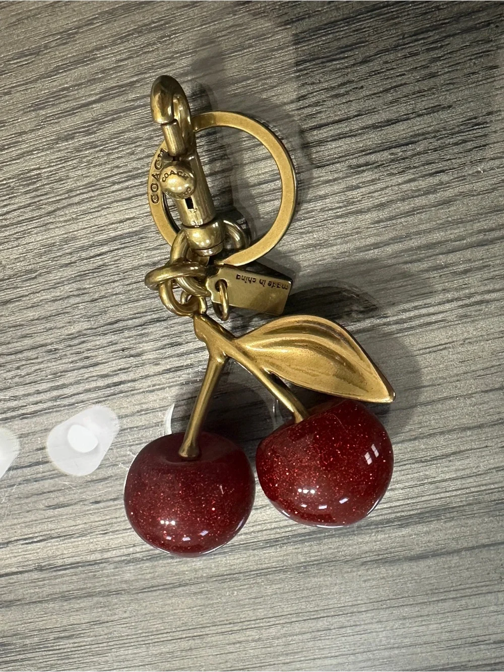 Coach Gold-Tone Hardware with Red Glitter Cherry Charm Keychain